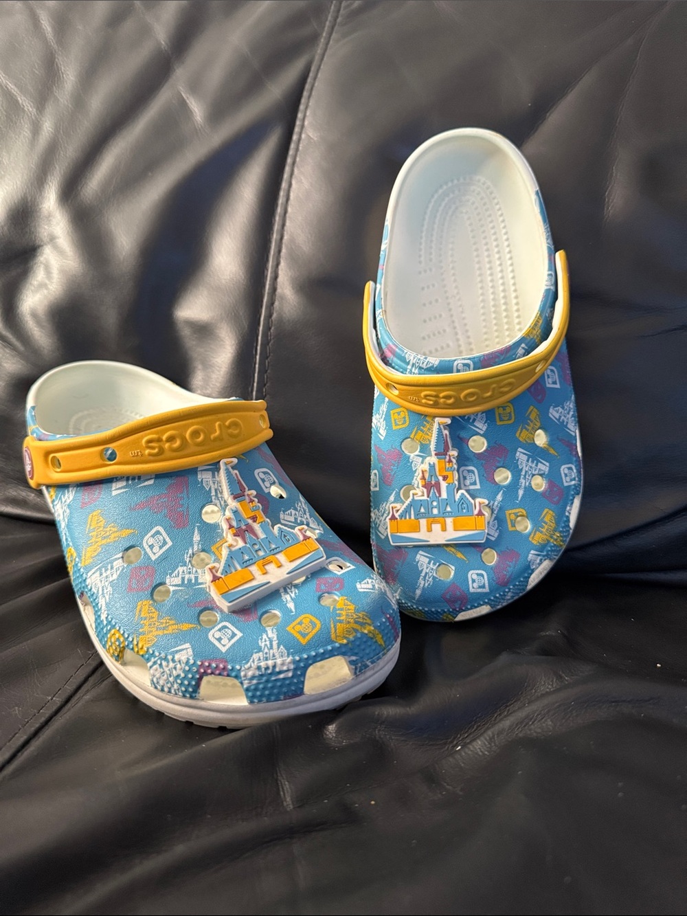 CROCS Kids Blue Castle Print Clogs with Yellow Strap